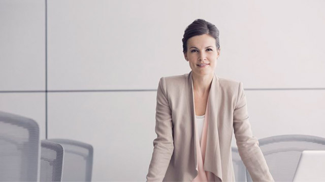 Confident woman in a board room