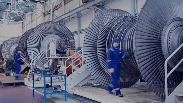 engineers with steam turbines small overlay