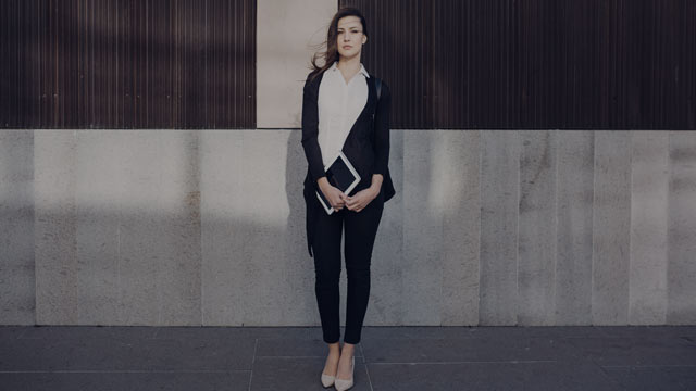 Young business woman with tablet.