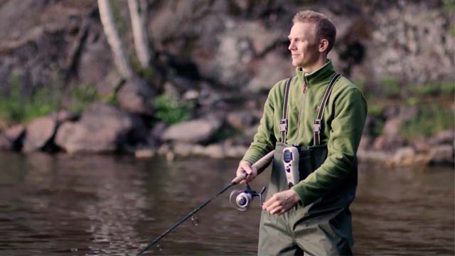 Man fishing with mosquito repellent