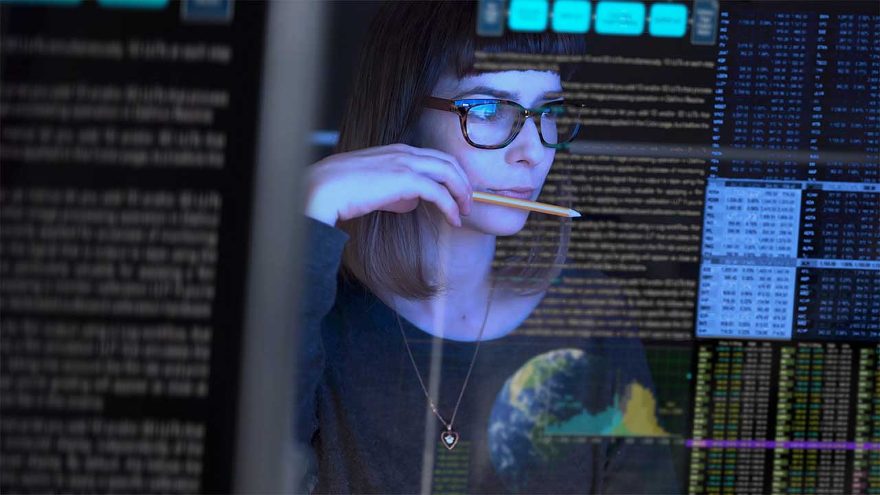 Woman watching computer screen