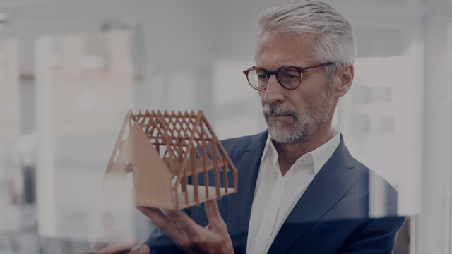 architect looking at model home small overlay