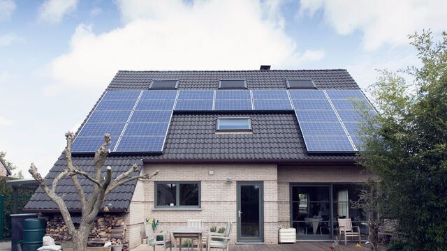 Bungalow with solar panels on roof