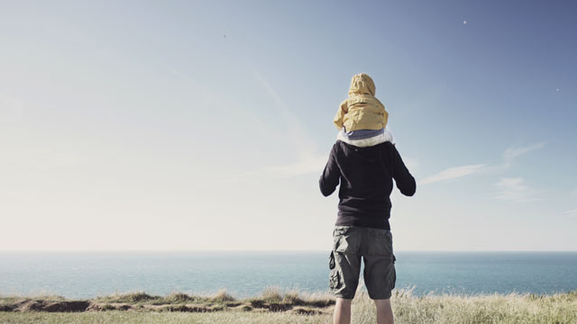 Father piggybackriding kid