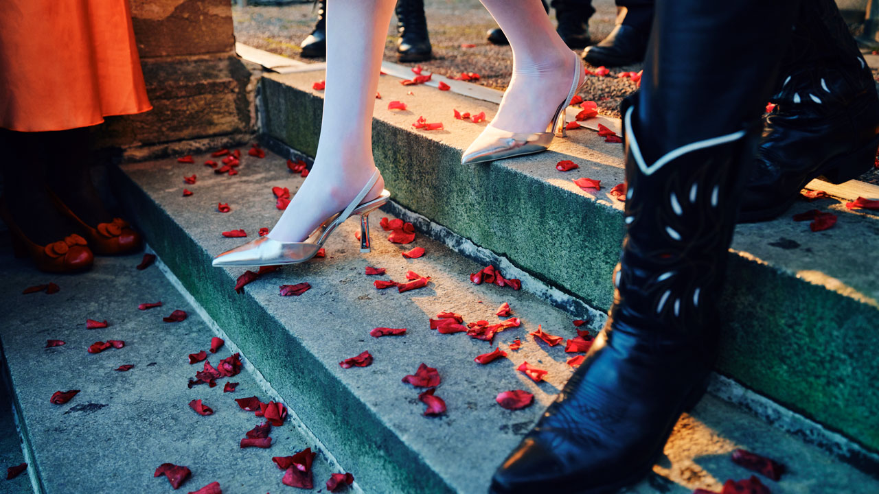 Wedding shoes walking down the stairs