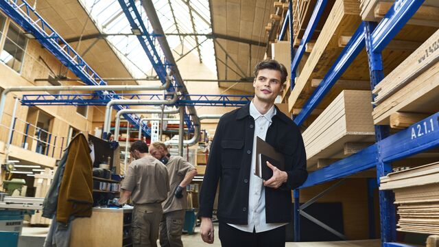 Next generation man walking at manufacturing SMALL