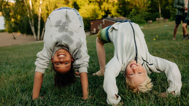 Kids playing in the grass