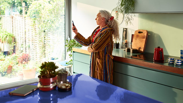 Older woman using her phone 